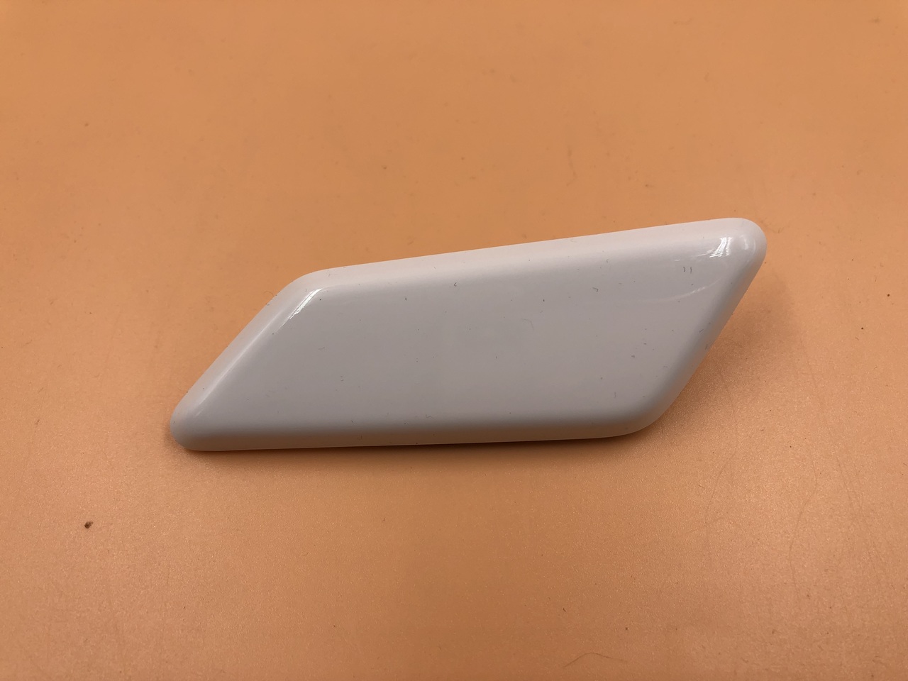 Крышка форсунки омывателя фары на Toyota RAV4 XA50 2019>