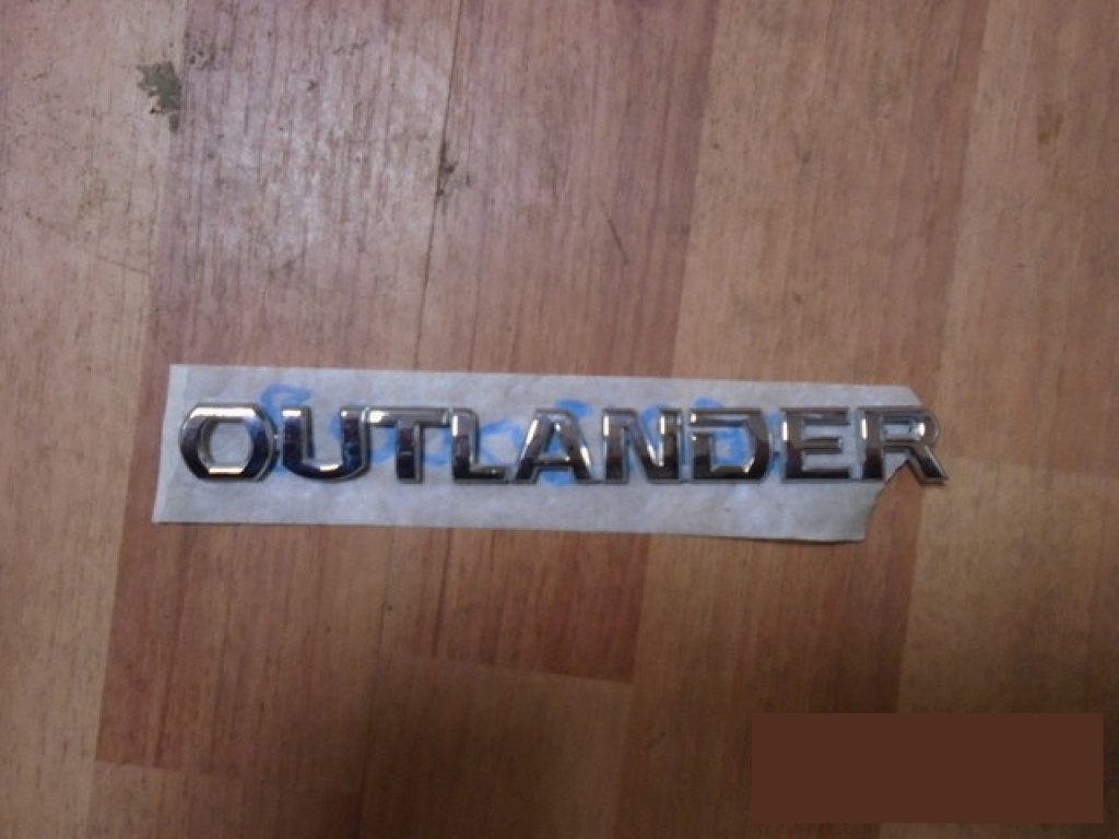 Эмблема на Mitsubishi Outlander 3 2012>