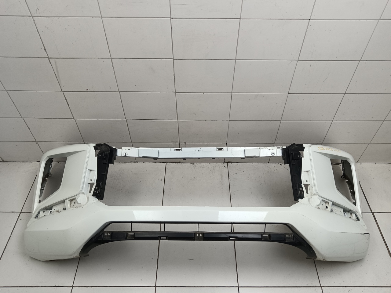 Бампер передний на Mitsubishi L200 5 KK KL 2015-2023